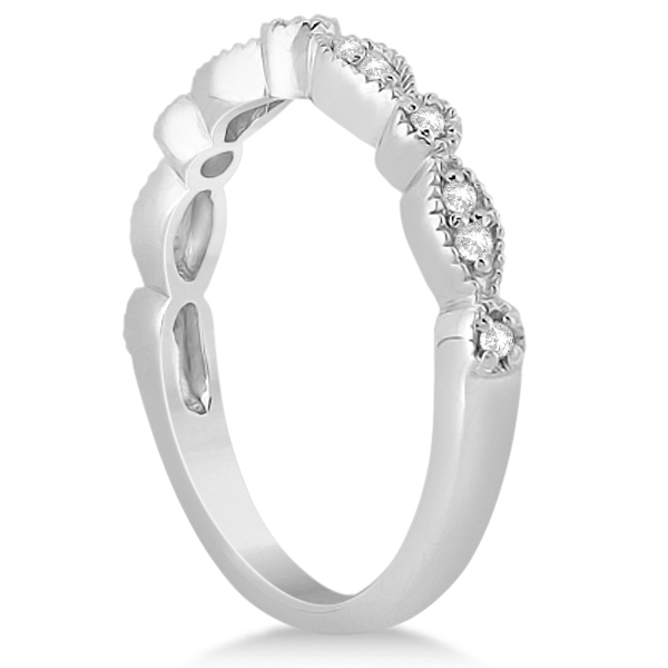 Petite Marquise & Dot Diamond Wedding Band 14k White Gold 0.13ct This beautiful 14 karat white gold band is stylized with an alternating circle-marquise design